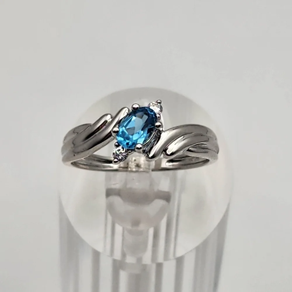Silver Tone Blue Topaz & Clear Cubic Zirconia Ring (8)